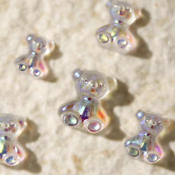 50pcs/пакет Малка мечка Aurora Crystal Phantom 3D прозрачен лазер мини нокти изкуство декорация маникюр DIY аксесоари